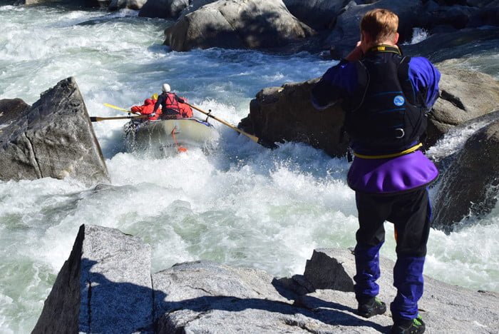 Sam shoots rafting photos on Cherry Creek